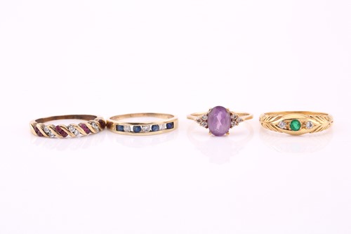 Lot 380 - A collection of four stone-set rings, a ruby...