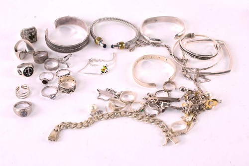 Lot 438 - A collection of silver and white metal...