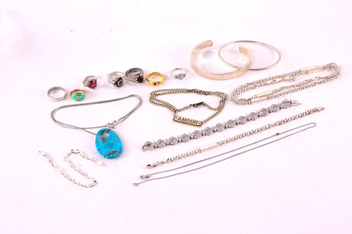 Lot 354 - A collection of silver and white metal...