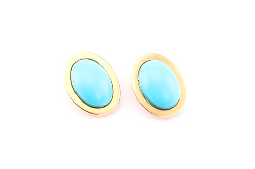 Lot 16 - A pair of turquoise ear clips, each consisting...