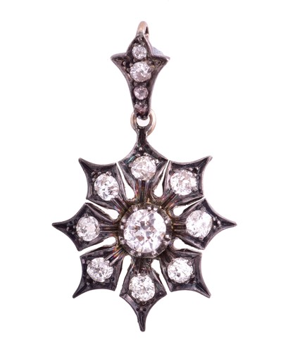 Lot 426 - A Victorian nine stone snowflake cluster...