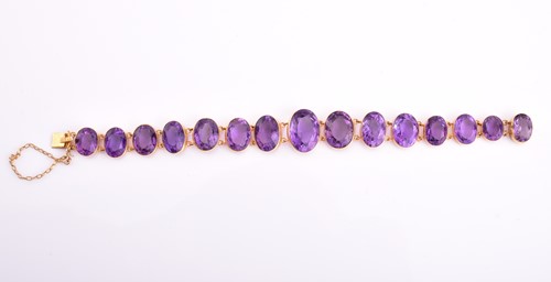 Lot 245 - A Victorian amethyst bracelet set in gold, the...