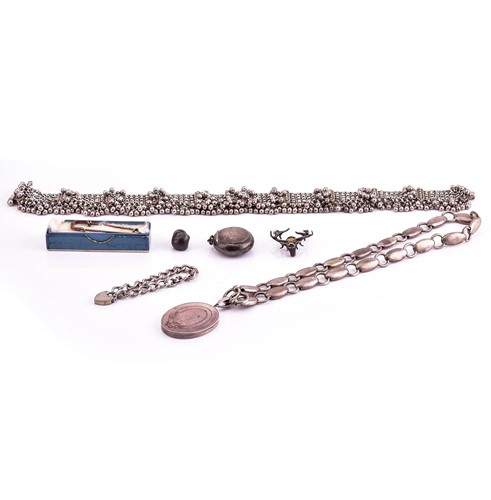 Lot 377 - A collection of white metal and silver...