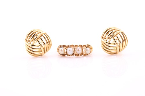 Lot 392 - A pair of yellow metal knot clip earrings,...