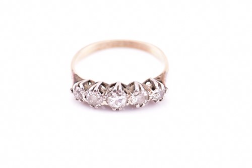 Lot 75 - A graduated five stone diamond ring, set with...