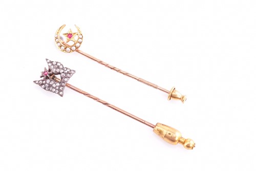 Lot 114 - A lot consisting of two stick pins, one set...
