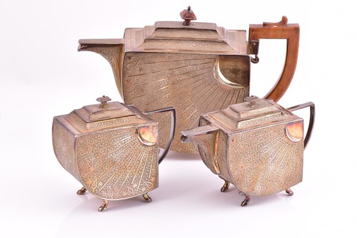 Lot 532 - An Indian white metal three-piece tea service...