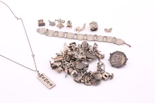 Lot 421 - A collection of white metal and silver...