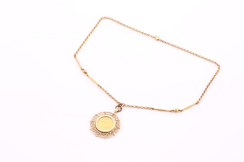 Lot 105 - A George V half sovereign, 1910, in 9ct gold...