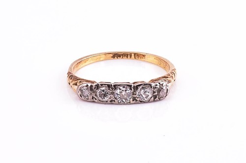 Lot 119 - A diamond half hoop ring, the five graduated...