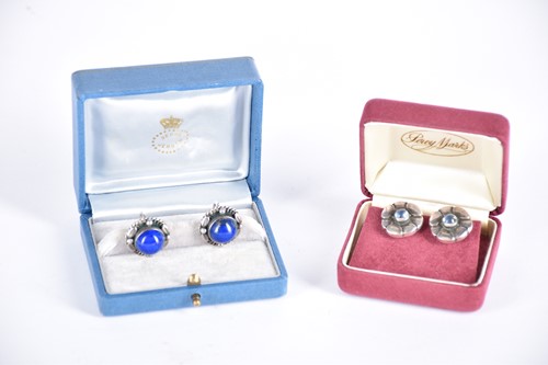 Lot 13 - Georg Jensen - a pair of lapis lazuli cabochon...
