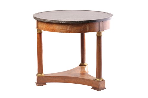 Lot 145 - A French Empire marble-topped circular...