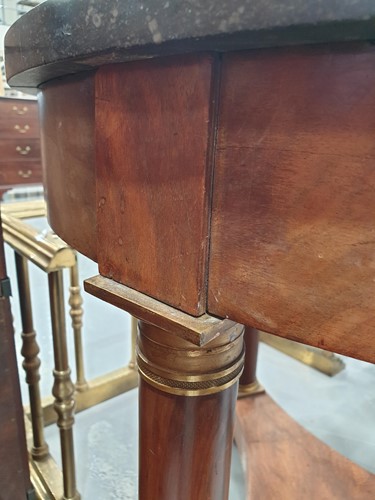 Lot 145 - A French Empire marble-topped circular...