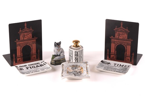 Lot 336 - A pair of Fornasetti metal bookends, 20 cm...