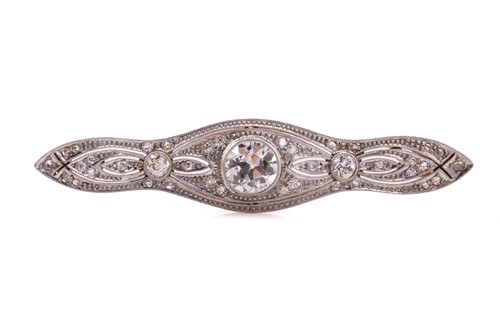 Lot 64 - A Belle Époque diamond bar brooch, comprises a...