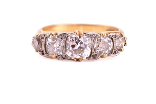 Lot 198 - A yellow gold and five stone diamond dress...