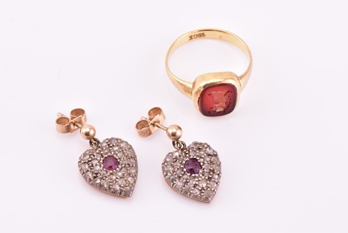 Lot 54 - A pair of diamond and ruby heart-shaped...
