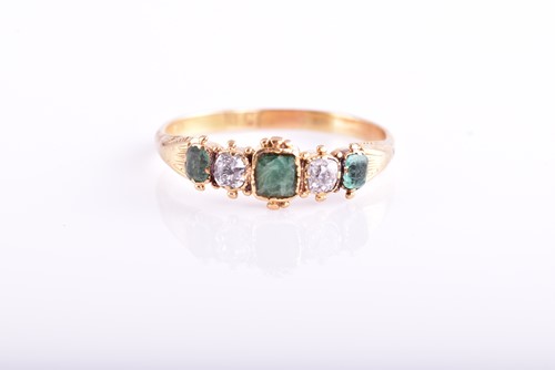 Lot 70 - A 19th century five stone half hoop emerald...