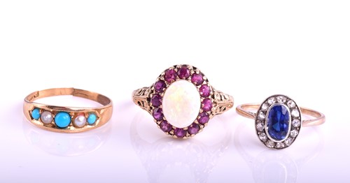 Lot 422 - A sapphire and rose diamond oval cluster ring,...