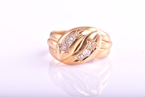 Lot 107 - An Edwardian 18 carat gold and diamond double...