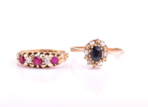Lot 115 - An Edwardian five stone half hoop graduated...