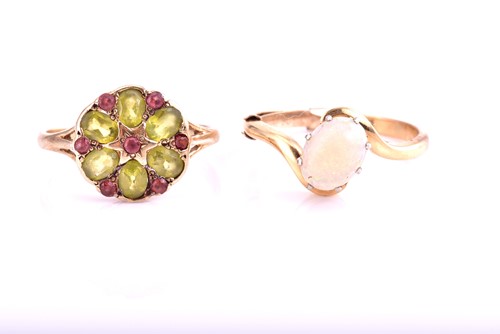Lot 83 - A single stone opal ring, the claw mounted...