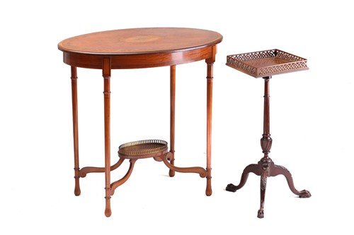 Lot 325 - A Sheraton style figured satinwood oval centre...