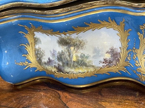 Lot 331 - A large Sevres style porcelain bombe casket,...