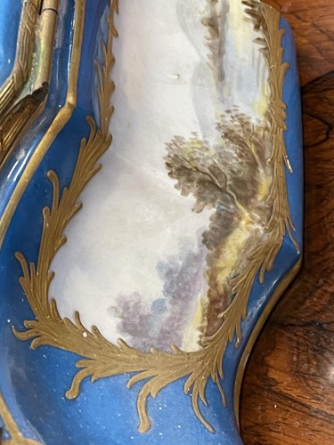 Lot 331 - A large Sevres style porcelain bombe casket,...