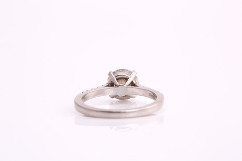 Lot 177 - A platinum diamond solitaire ring, consisting...