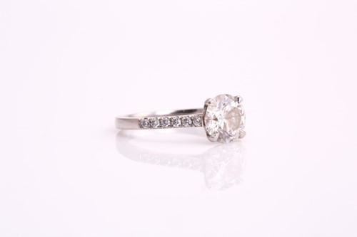 Lot 177 - A platinum diamond solitaire ring, consisting...
