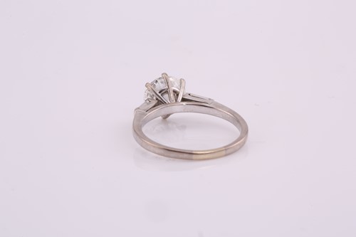 Lot 120 - A diamond engagement ring, consisting of a...