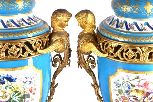 Lot 494 - A large pair of Sevres ormolu mounted pedestal...