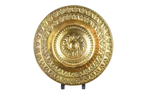 Lot 573 - A 17th century Nuremburg embossed brass alms...