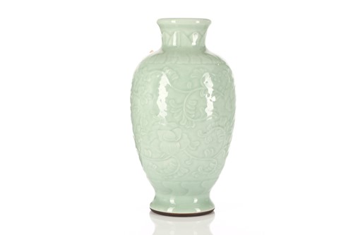 Lot 121 - A Chinese celadon glaze vase, the neck with...