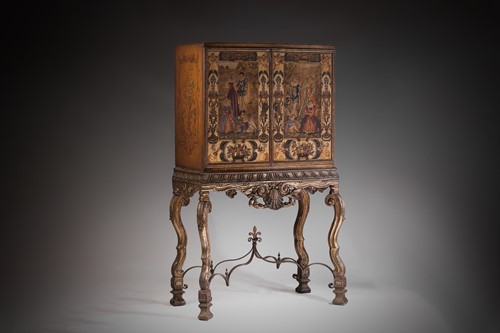 Lot 379 - A 17th-century style stump worked cabinet on...