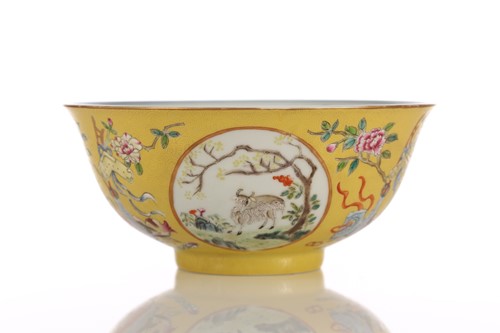 Lot 94 - A Chinese yellow ground bowl, 20th century,...