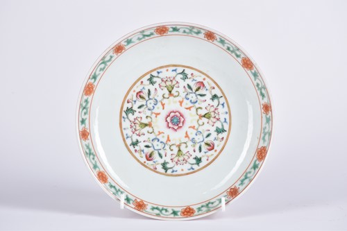 Lot 190 - A Chinese famille rose saucer dish, painted...