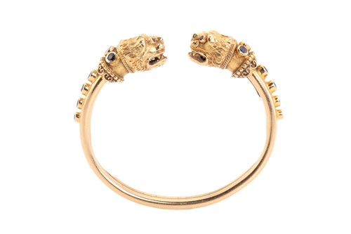 Lot 1 - A LALAoUNIS gem-set torque bangle, from Greek...
