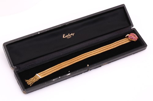 Lot 50 - A Kutchinsky ruby and diamond slide bracelet,...