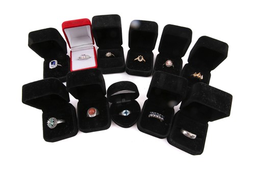 Lot 45 - Ten stone-set rings of base metal and one...
