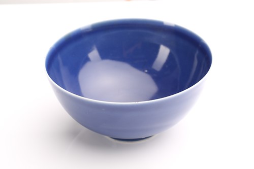 Lot 75 - A Chinese blue glazed deep sided bowl, the...