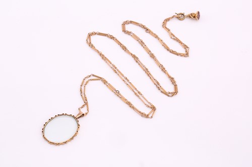 Lot 167 - A long fancy chain with glass pendant and fob...