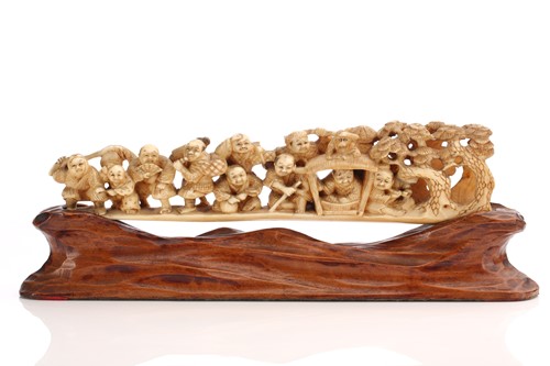Lot 190 - A Japanese ivory okimono, Meiji period, carved...