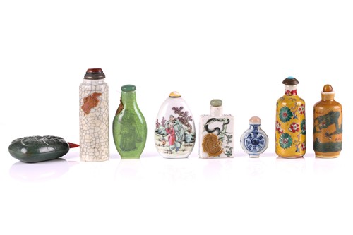 Lot 76 - A collection of eight Chinese porcelain snuff...