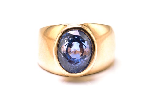 Lot 214 - A sapphire cocktail ring, featuring an oval...