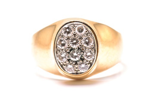 Lot 25 - A signet ring pavé set with diamonds,...