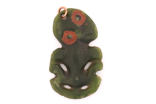 Lot 324 - A New Zealand Maori Tiki greenstone pendant,...