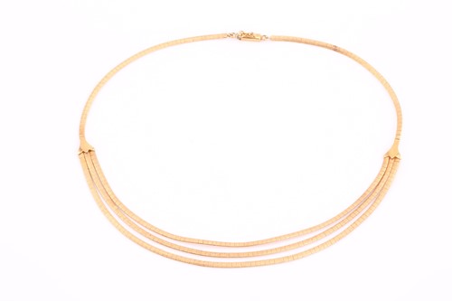 Lot 154 - A three-stranded flat link chain in yellow...