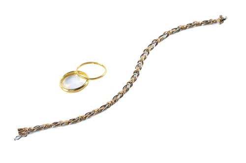Lot 177 - A 9ct gold bracelet and two 22ct gold plain...